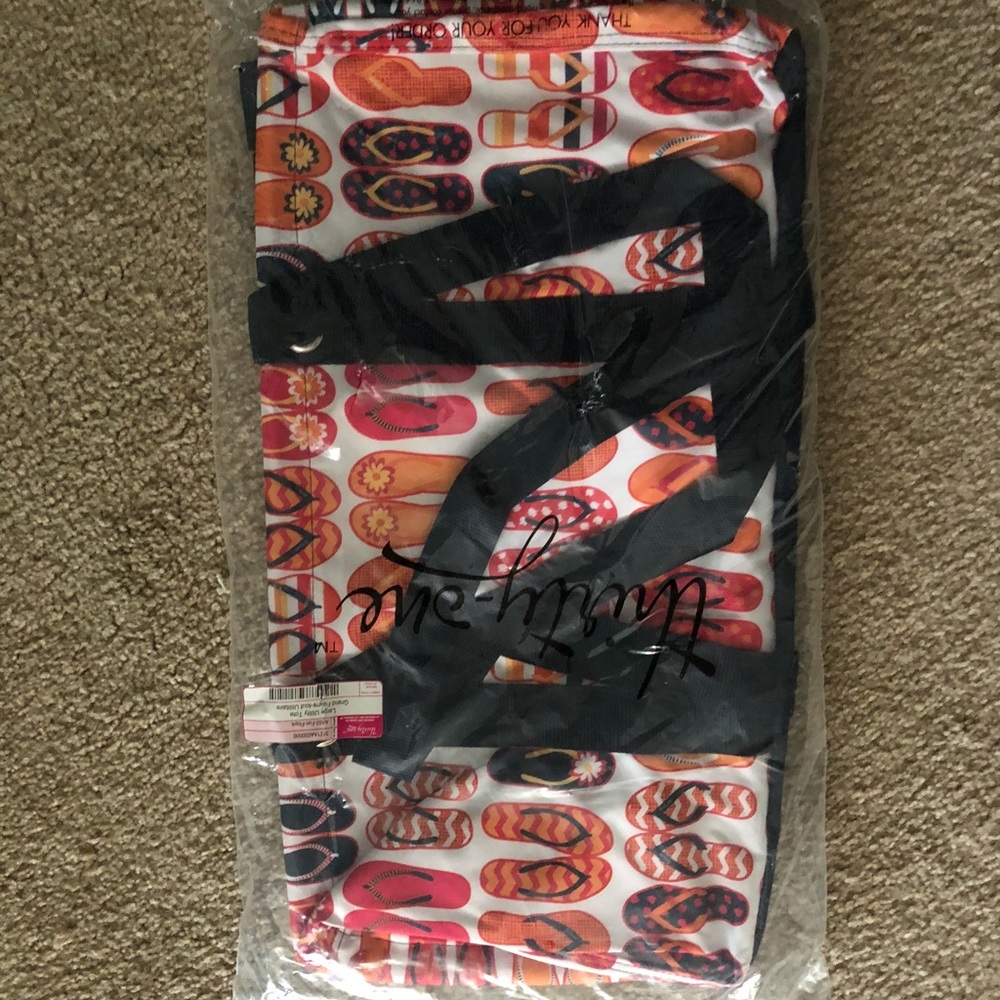 Thirty one large utility totes flip flops